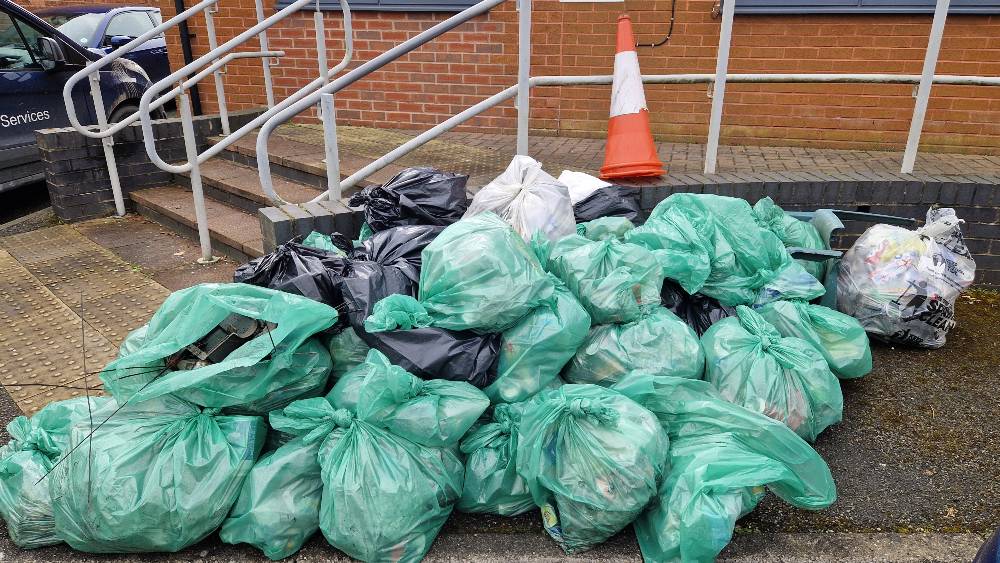 Collection of full bin bags