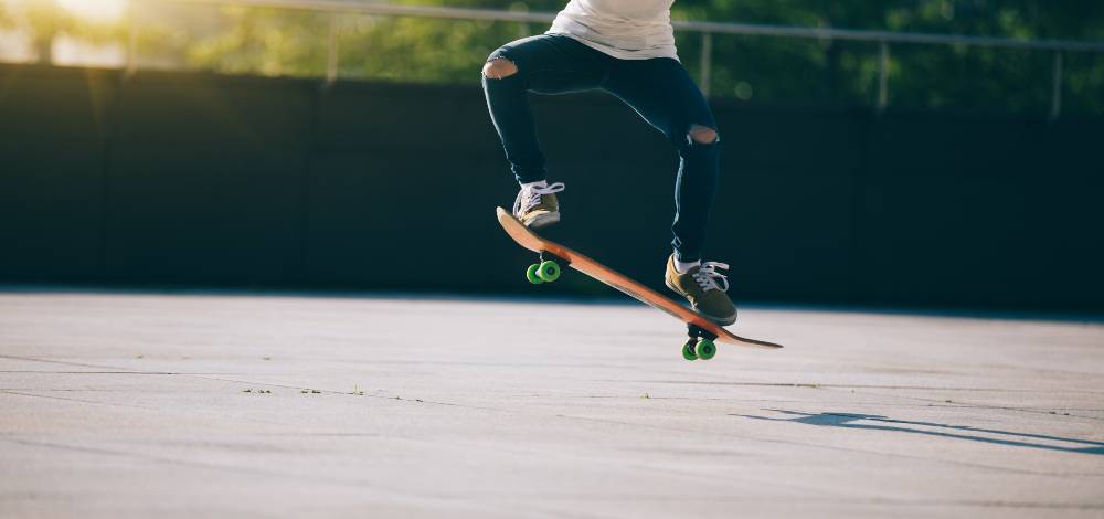young person skateboarding doing trick