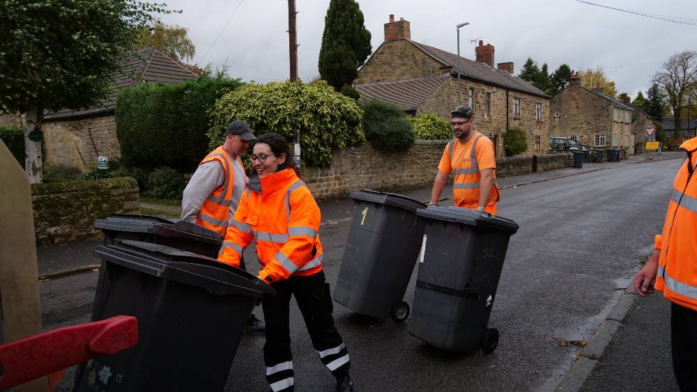 Cllr Cupit with refuse team