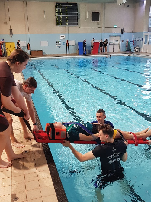 Photo shows lifeguards being put through their paces in the pool